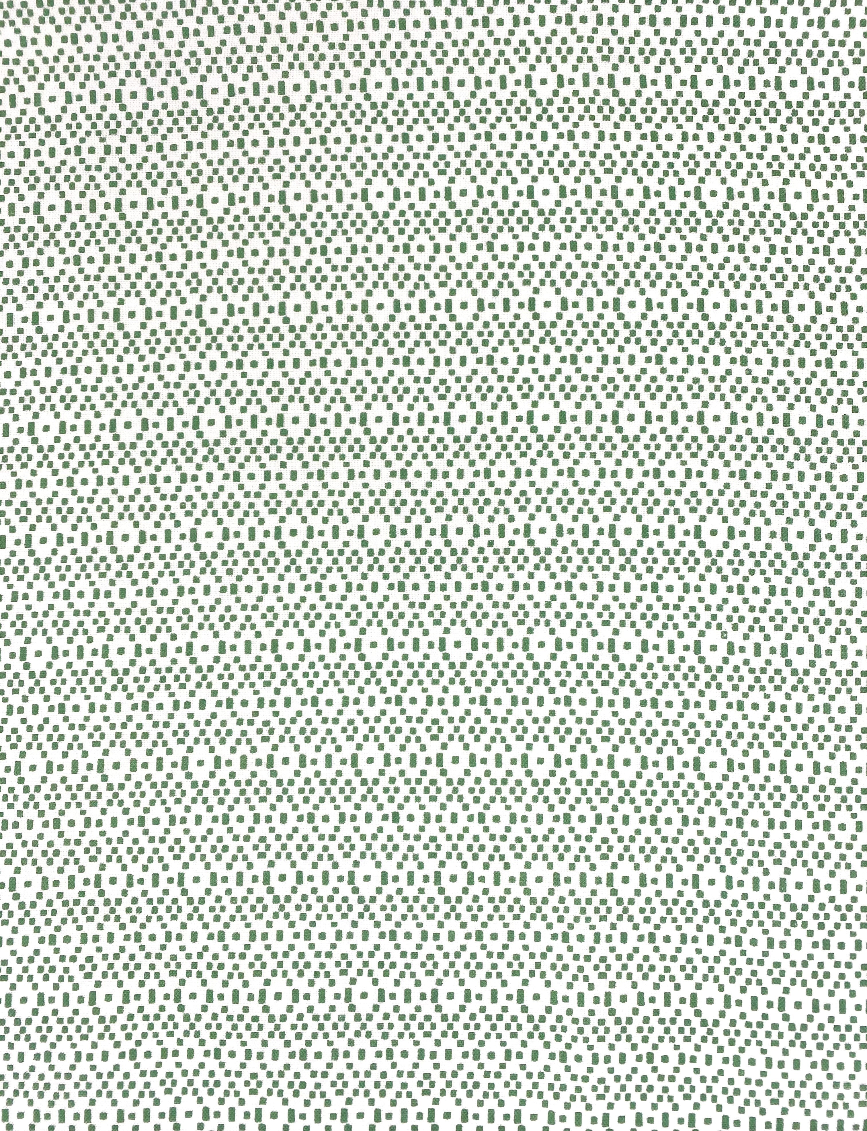 Geometric fabric printed on sustainable linen for interiors in green color.