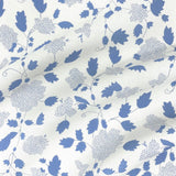 Floral fabric printed on sustainable linen for interiors in blue color.