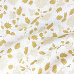Floral fabric printed on sustainable linen for interiors in yellow color.