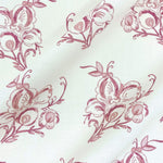 Floral fabric printed on sustainable linen for interiors in pink color.